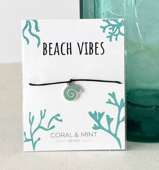 Beach Vibes' Teal Ammonite Shell Charm Bracelet.